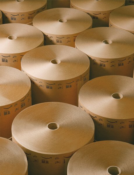 Neatly wound cylinders of paper rolls.