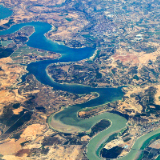 Water winds through a landscape. 