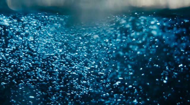 Water droplets rise to the surface. 