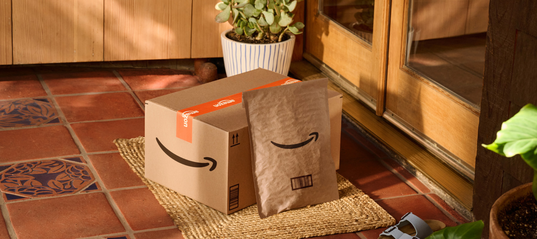 Boxes sitting on a doorstep. 